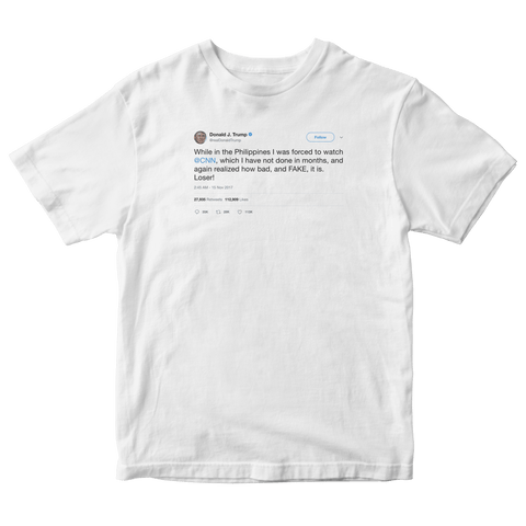 Donald Trump watching CNN in the Phillippines tweet on a white t-shirt from Tee Tweets