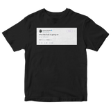 Ariana Grande what the fuck is going on tweet on a black t-shirt from Tee Tweets