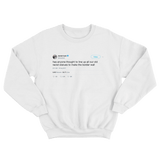 Daniel Tosh border wall of racist statues tweet on a white crewneck sweater from Tee Tweets
