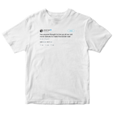 Daniel Tosh border wall of racist statues tweet on a white t-shirt from Tee Tweets