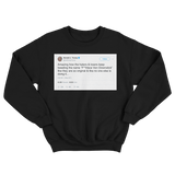 Donald Trump tweet about Jon Stewart's nickname for him on a black crewneck sweater from Tee Tweets