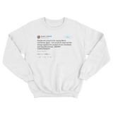 Donald Trump proud to say Merry Christmas again tweet on a white crewneck sweater from Tee Tweets