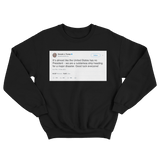 Donald Trump the United States has no president tweet on a black crewneck sweater from Tee Tweets