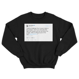 Justin Bieber challenges Tom Cruise to fight tweet on a black crewneck sweatshirt from Tee Tweets
