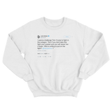 Justin Bieber challenges Tom Cruise to fight tweet on a white crewneck sweatshirt from Tee Tweets