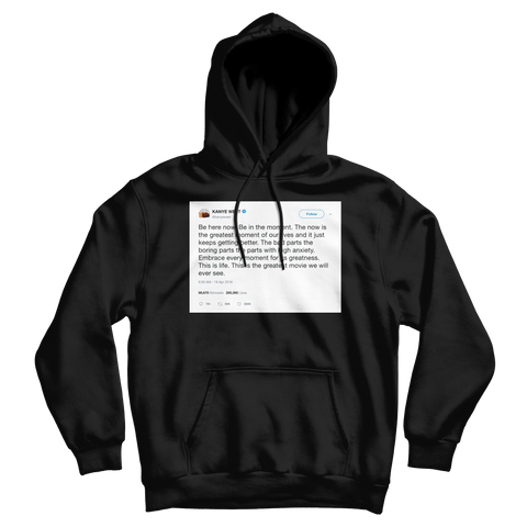 Kanye West be in the moment tweet on a black hoodie from Tee Tweets
